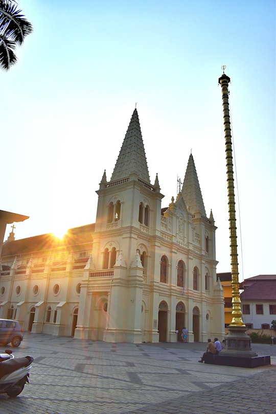 white concrete building during daytime in Santa Cruz Cathedral Basilica India