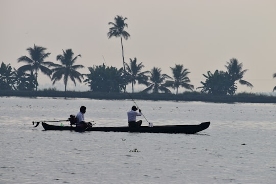2 person riding on boat during daytime in Alleppey India
