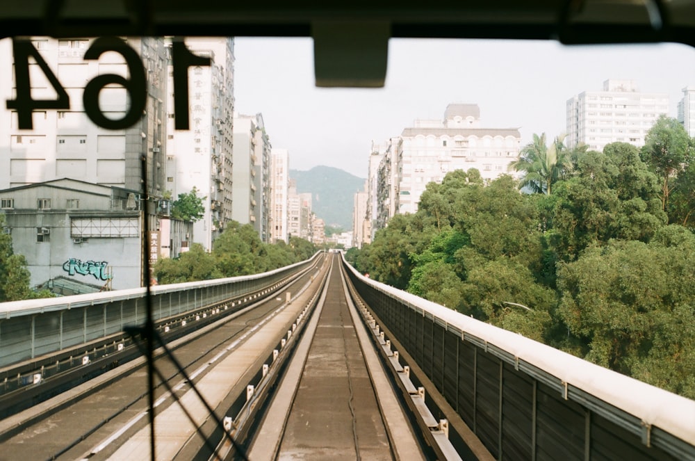 a view of a train track from inside a vehicle