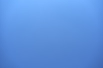 A clear blue sky with no visible clouds or objects.