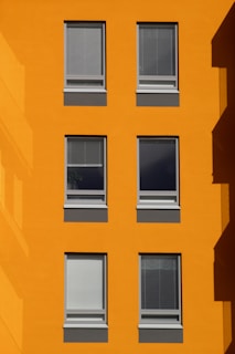 white wooden framed glass window