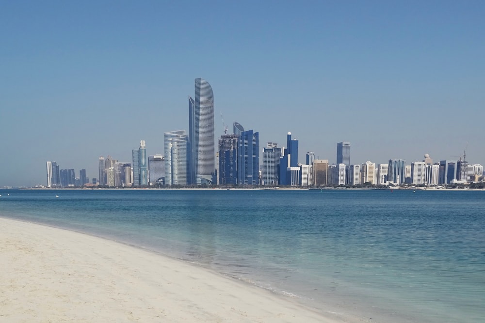 city skyline across the sea during daytime