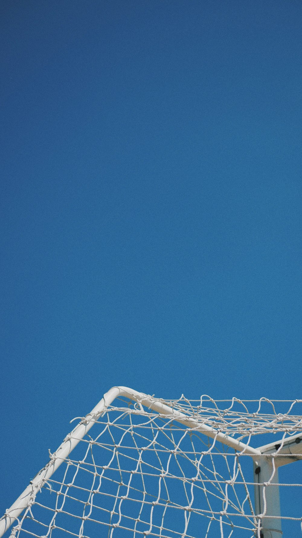 white metal frame under blue sky during daytime