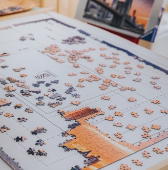 white and brown jigsaw puzzle