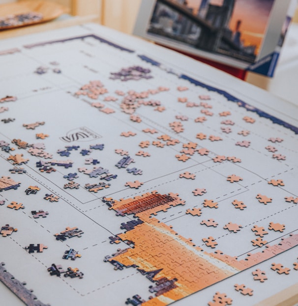 white and brown jigsaw puzzle