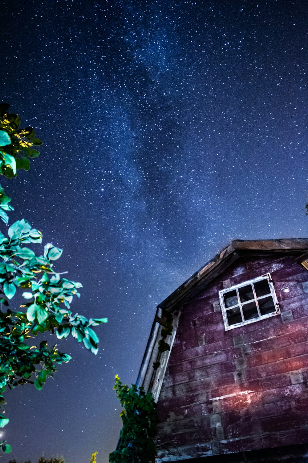 brown brick house under blue sky