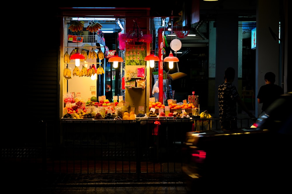 people standing in front of food display counter