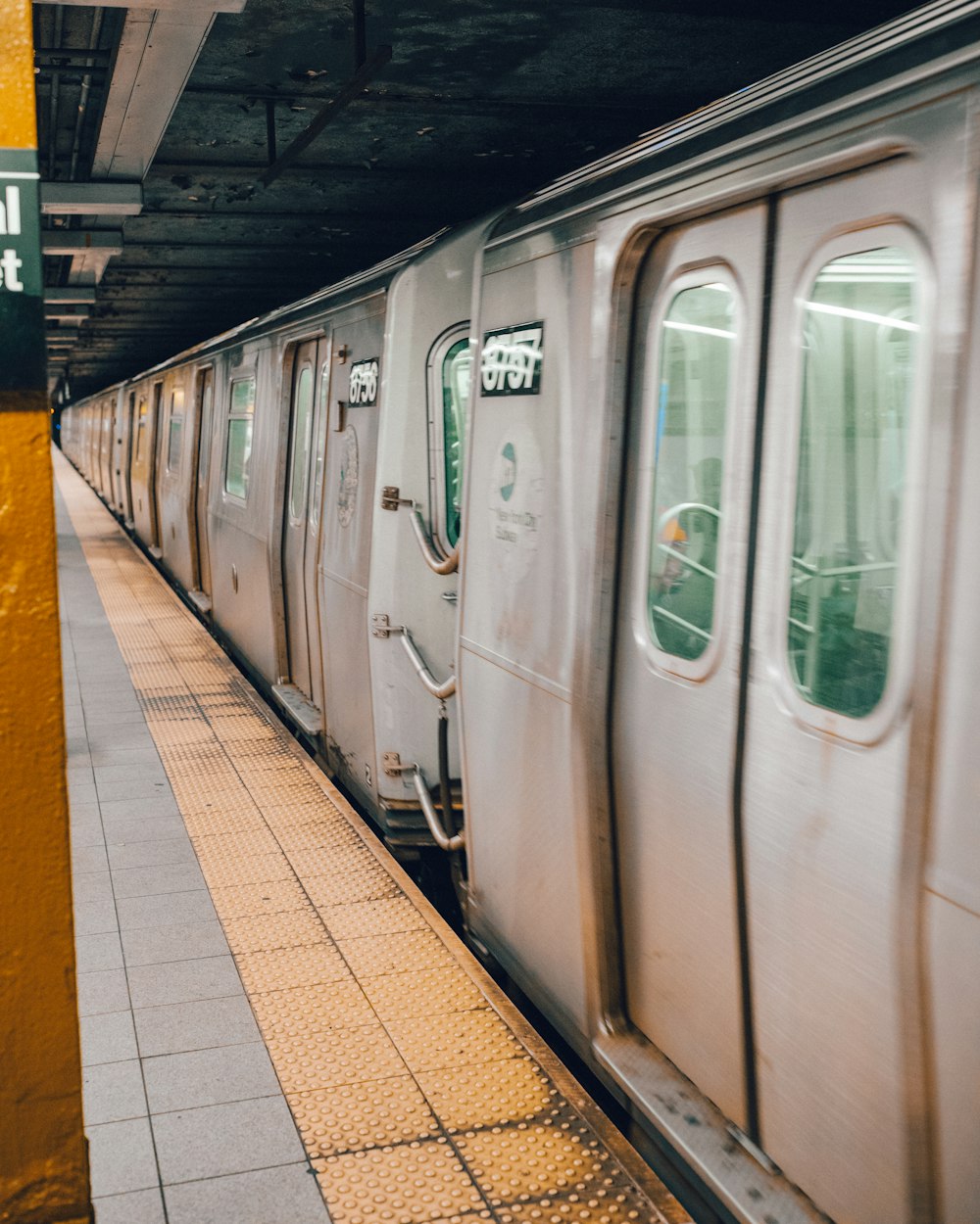 gray train in train station