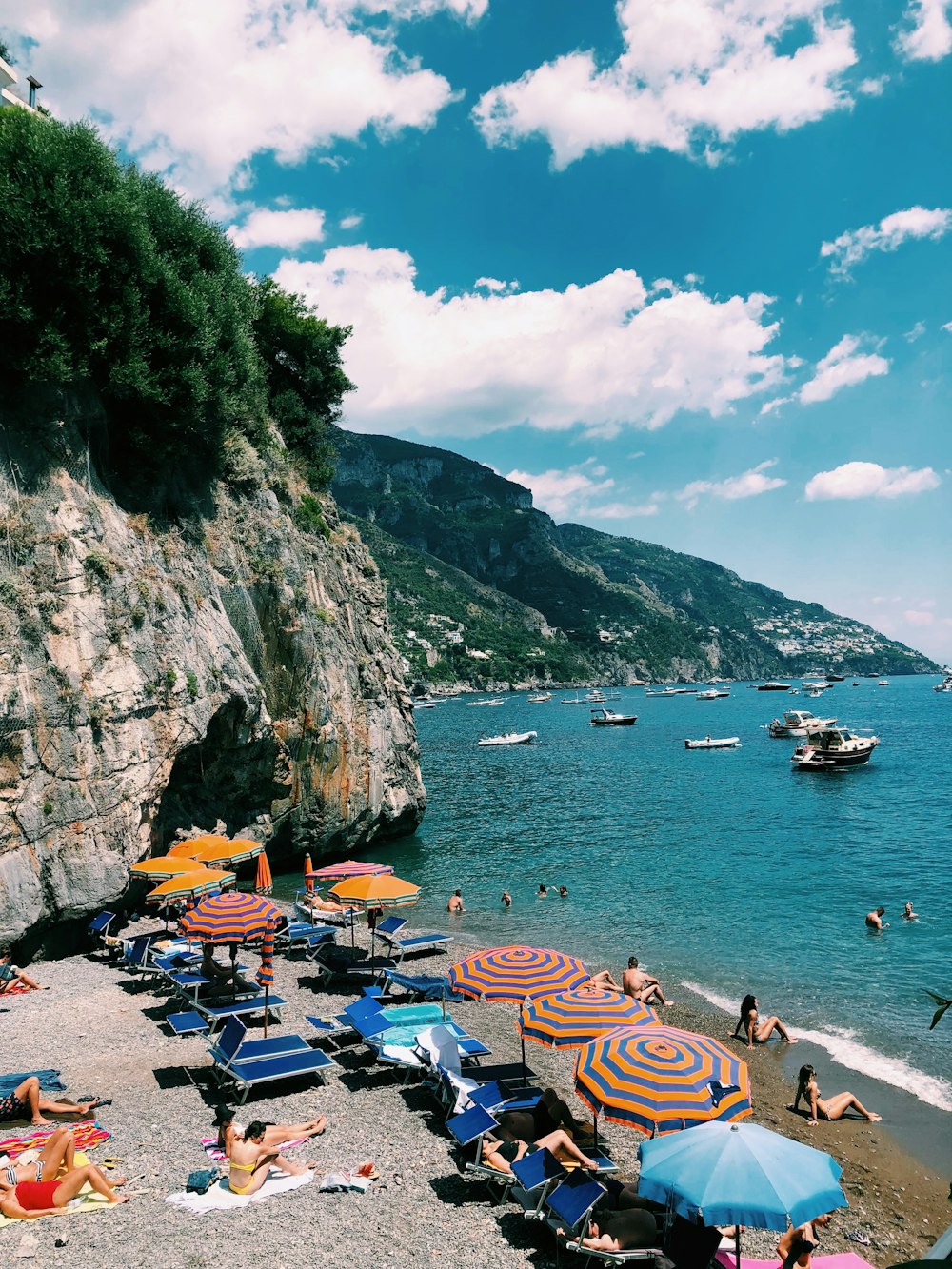 people on beach during daytime