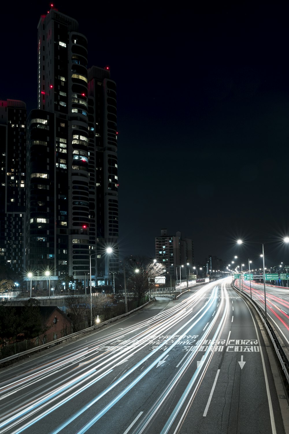 time lapse photography of city lights during night time