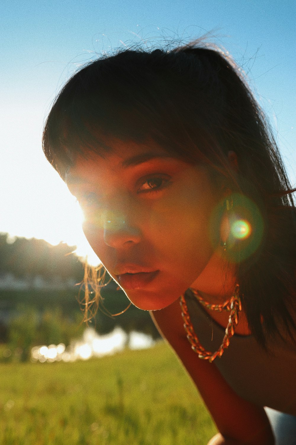 girl in yellow and white beaded necklace