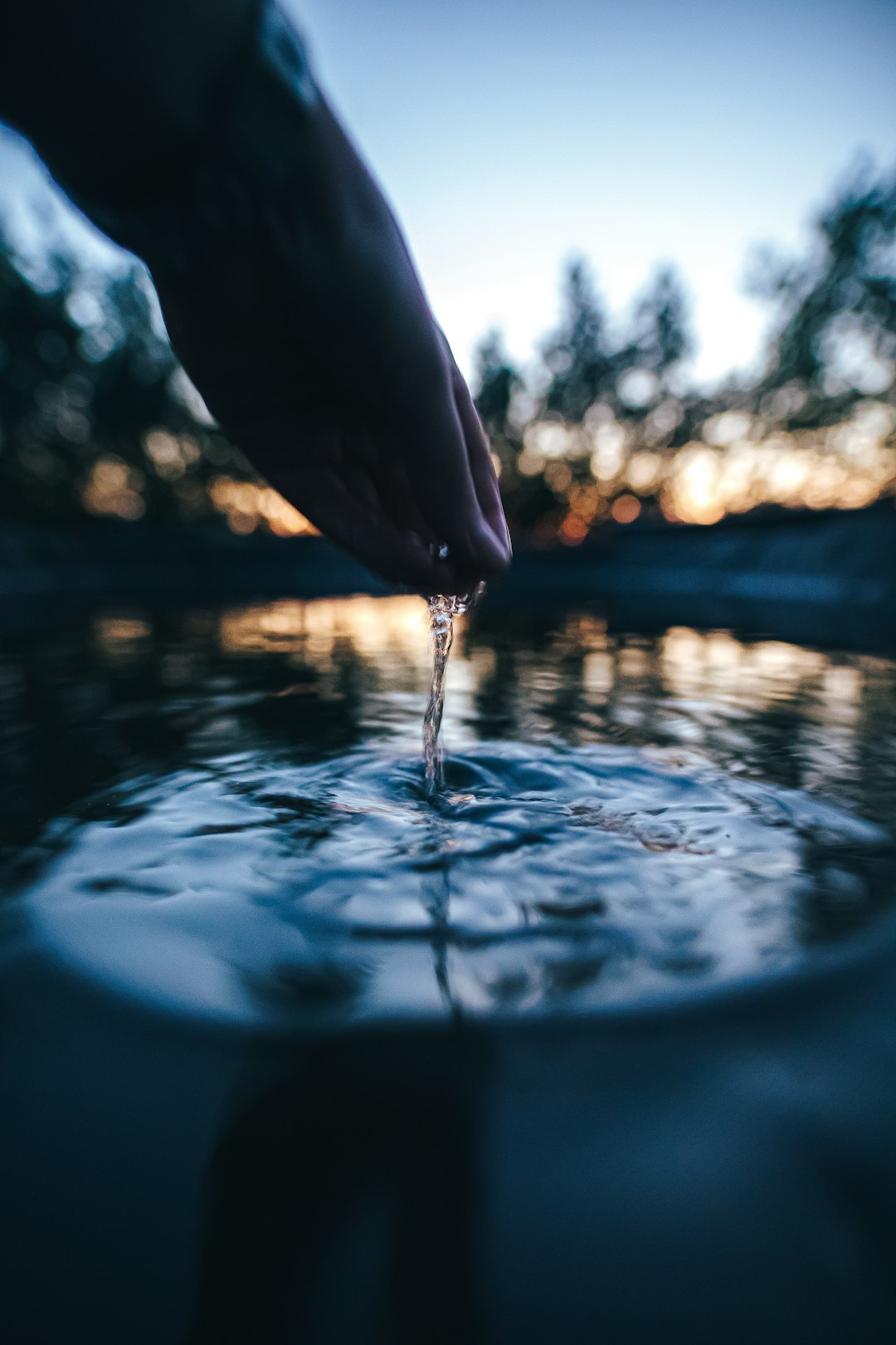 water drop on body of water