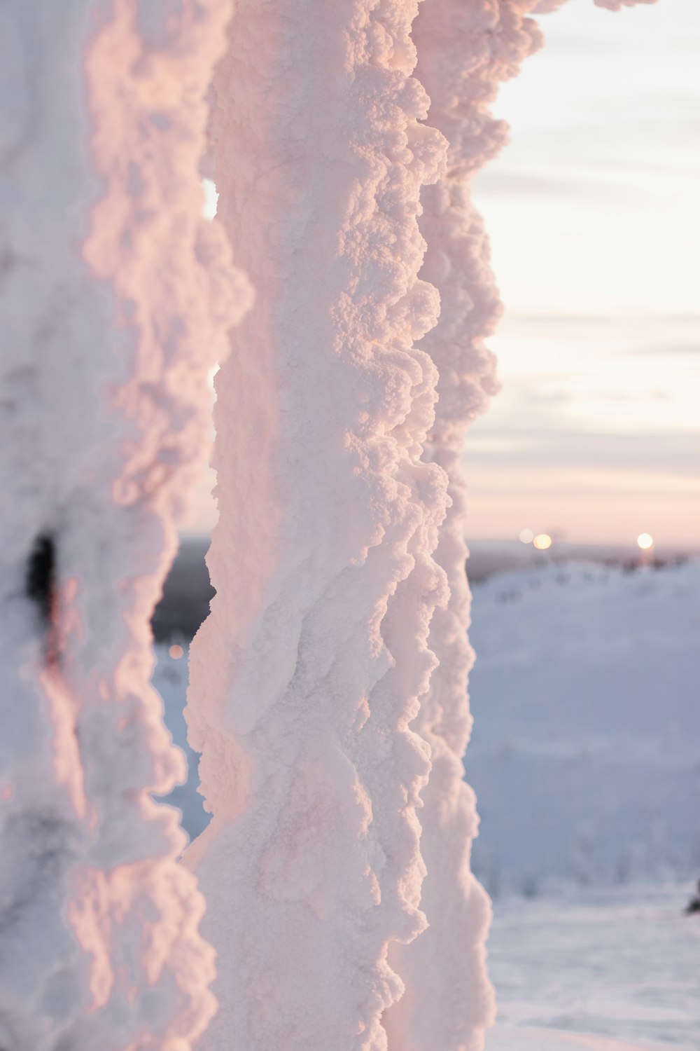 white clouds over the sea during sunset