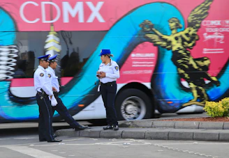 Local police officers patrolling a vibrant neighborhood in Querétaro