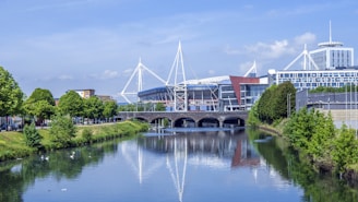 a river running through a city next to tall buildings
