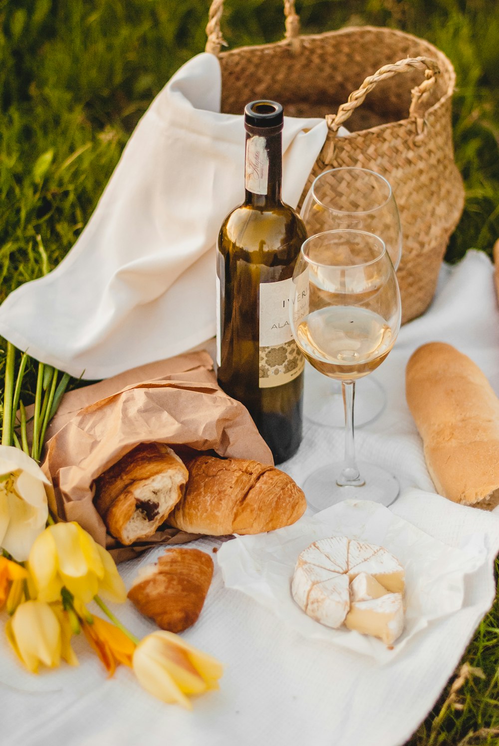 bread and wine bottle on table
