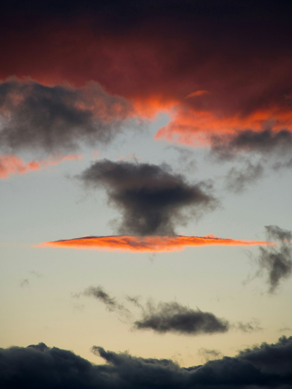 white clouds over body of water