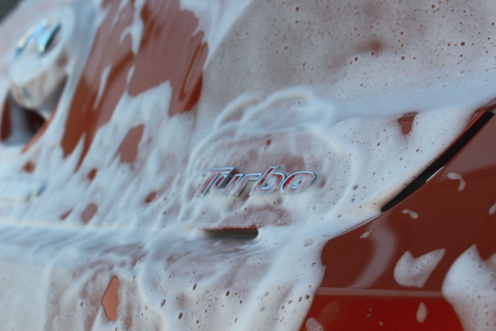 water droplets on red surface