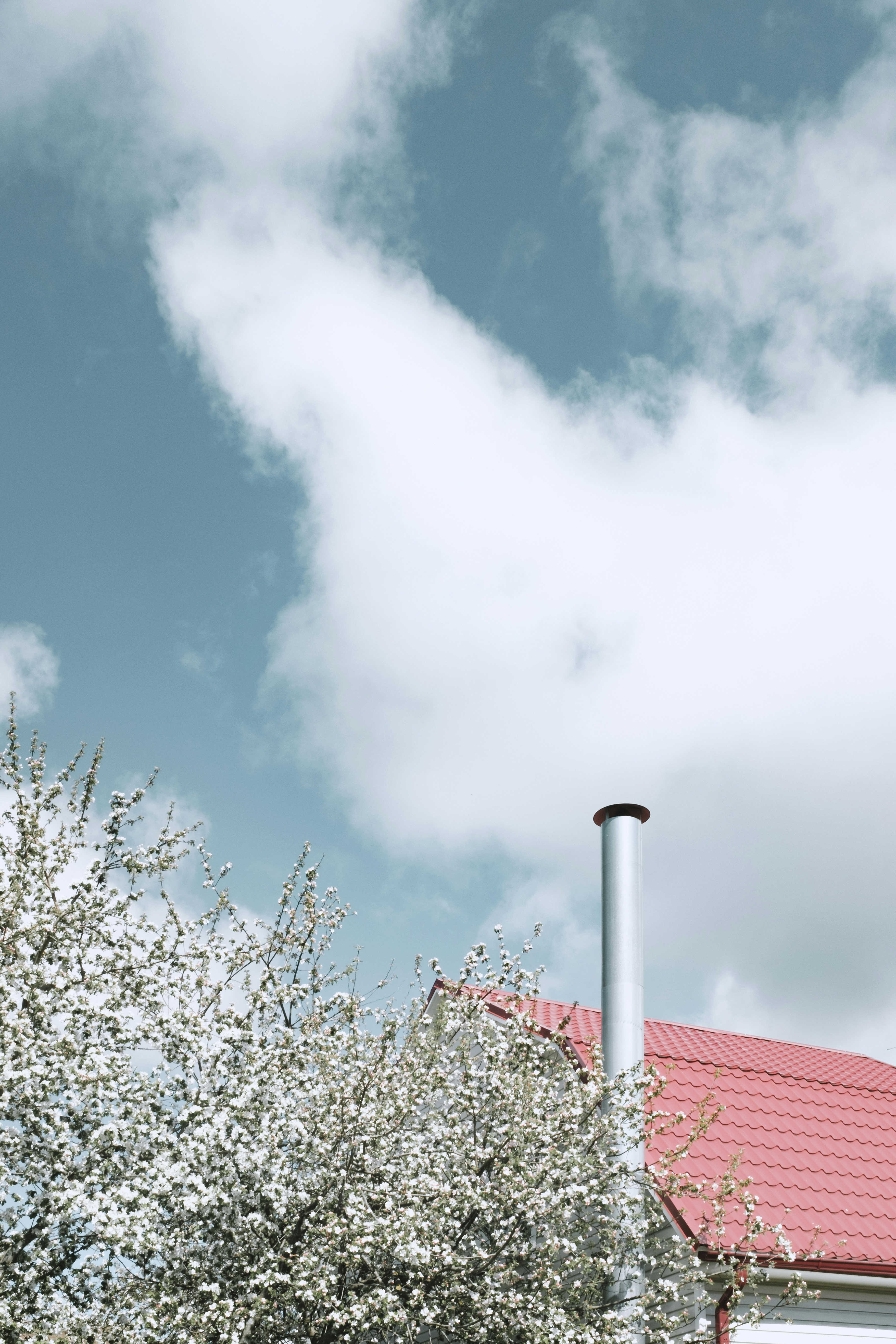 white and red roof under blue sky during daytime