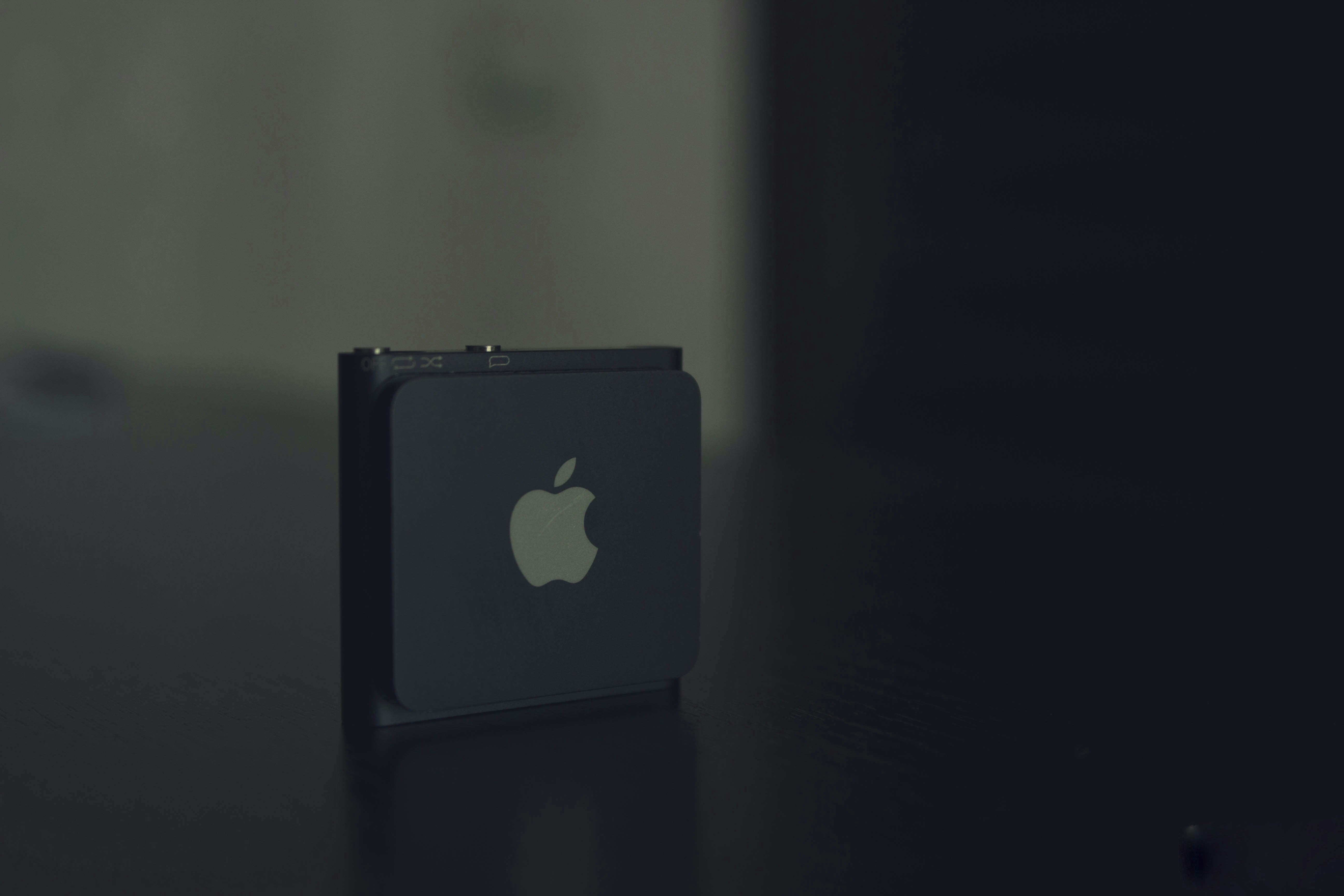 silver iphone 6 on white table