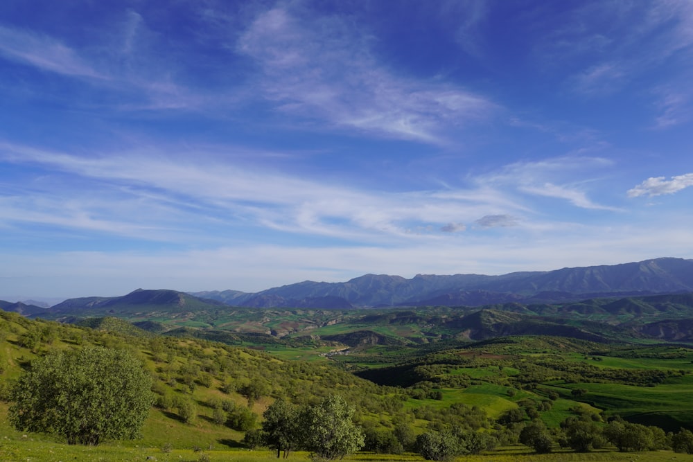 green mountains under blue sky during daytime