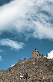 A vibrant group of travelers exploring a historic site in Alicante province.