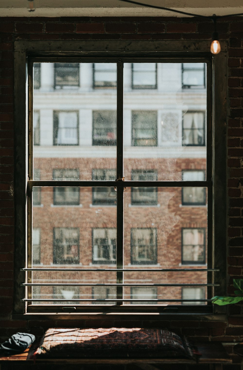 brown wooden framed glass window