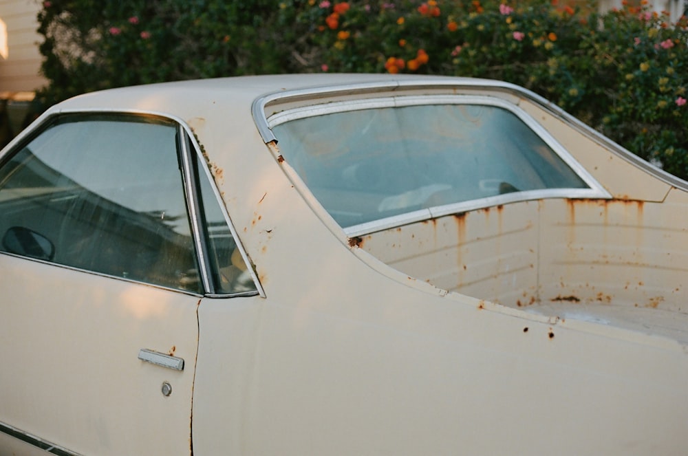 white car with open door