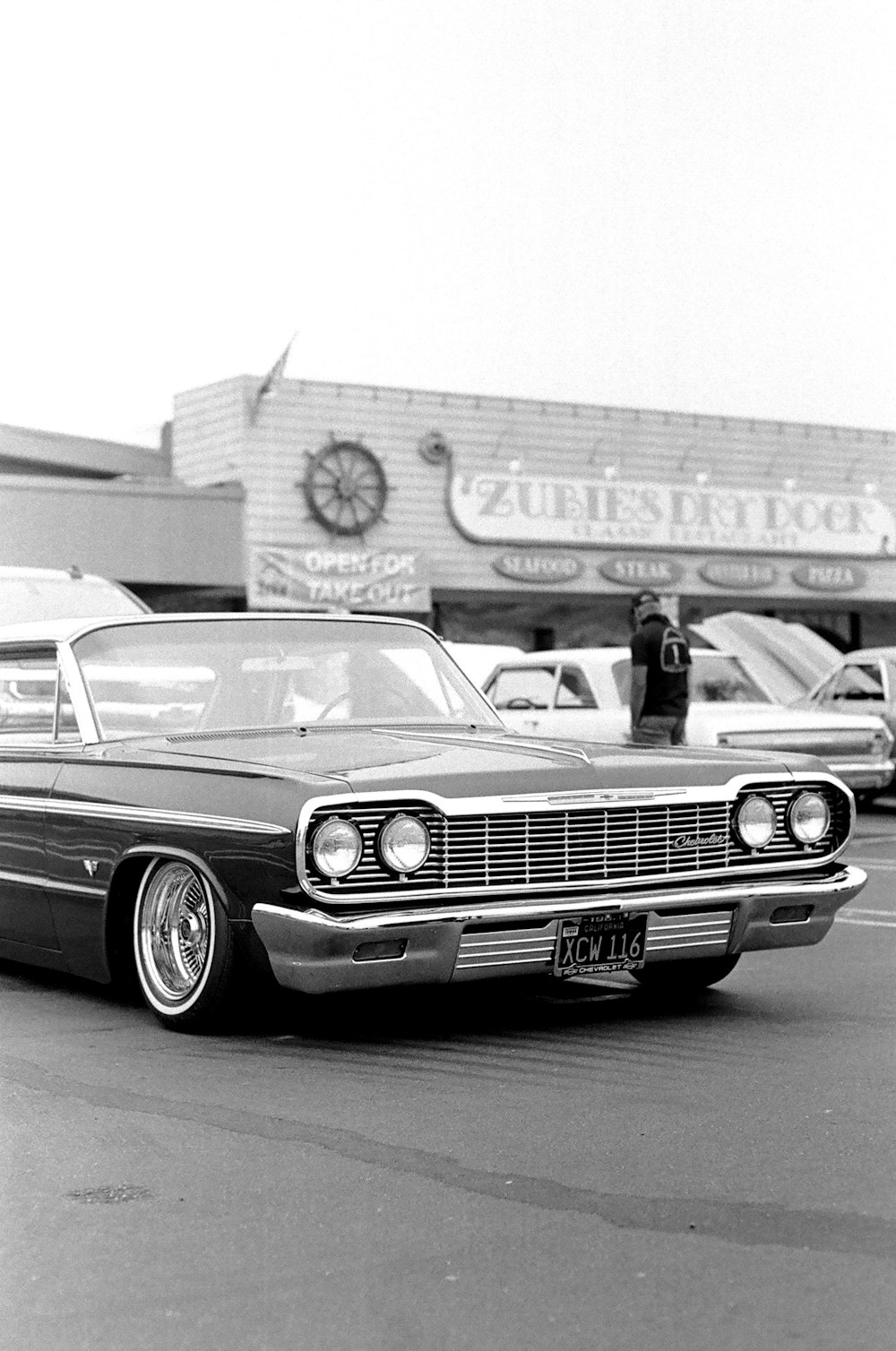 grayscale photo of classic car