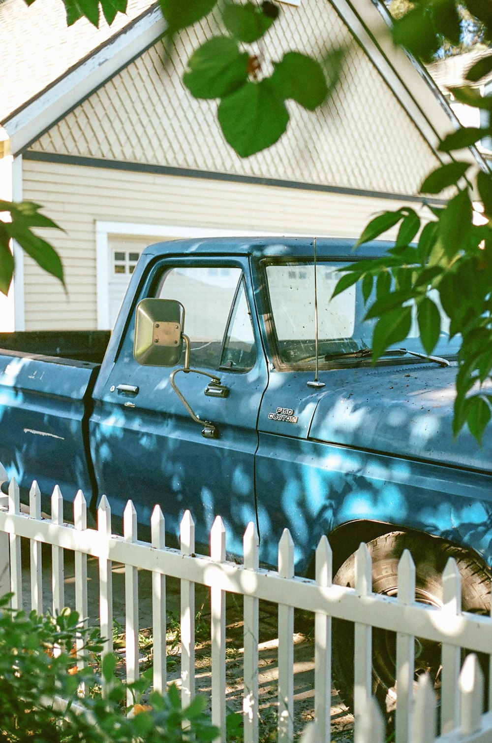 green single cab pickup truck