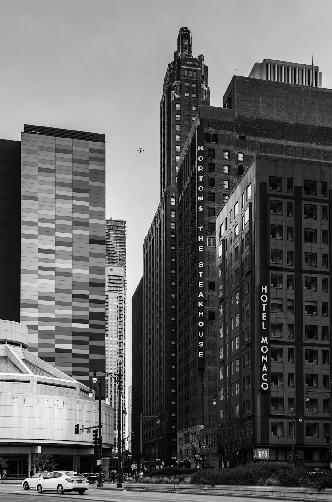 grayscale photo of high rise buildings