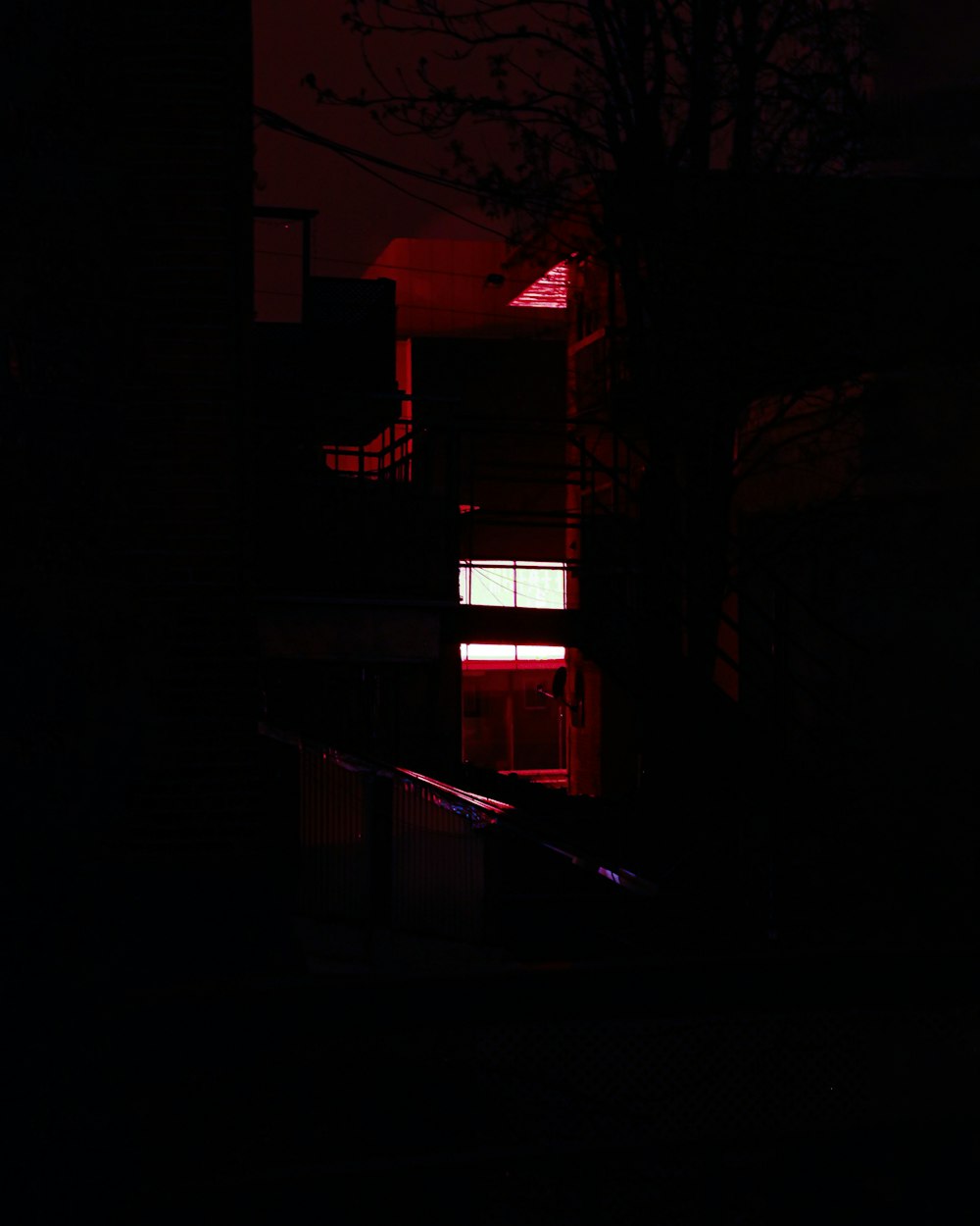 red and white concrete building during night time