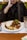 A satisfied diner at a Chicago halal restaurant with a delicious plate of food.