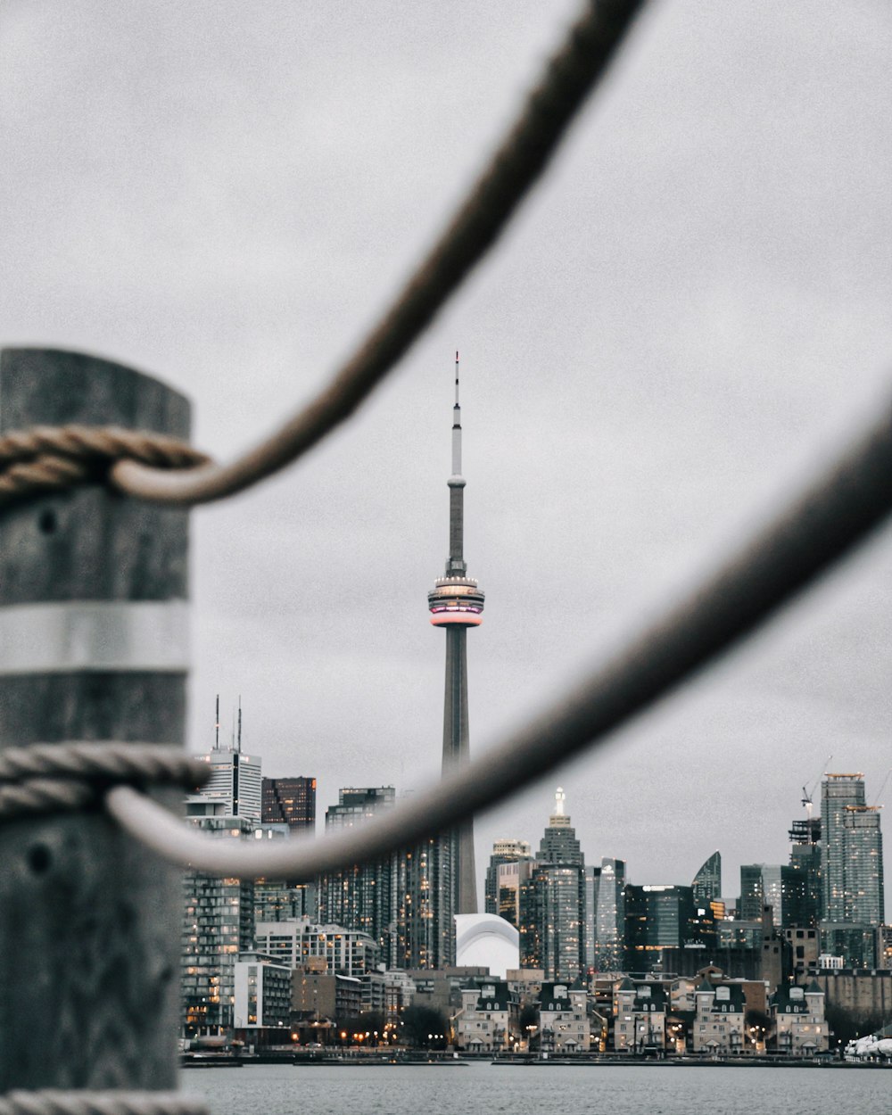 brown rope near city buildings during daytime