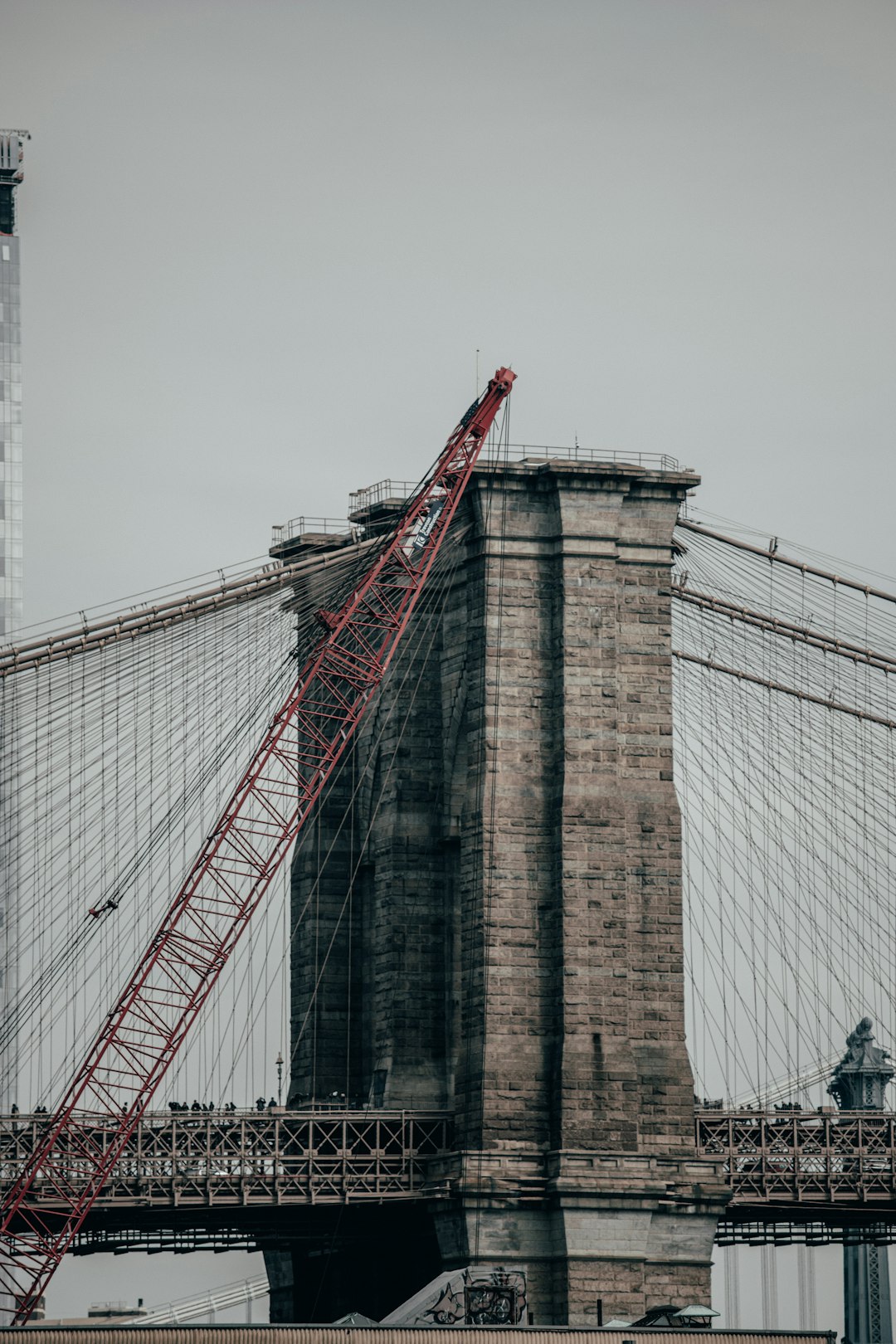 red bridge under white sky during daytime