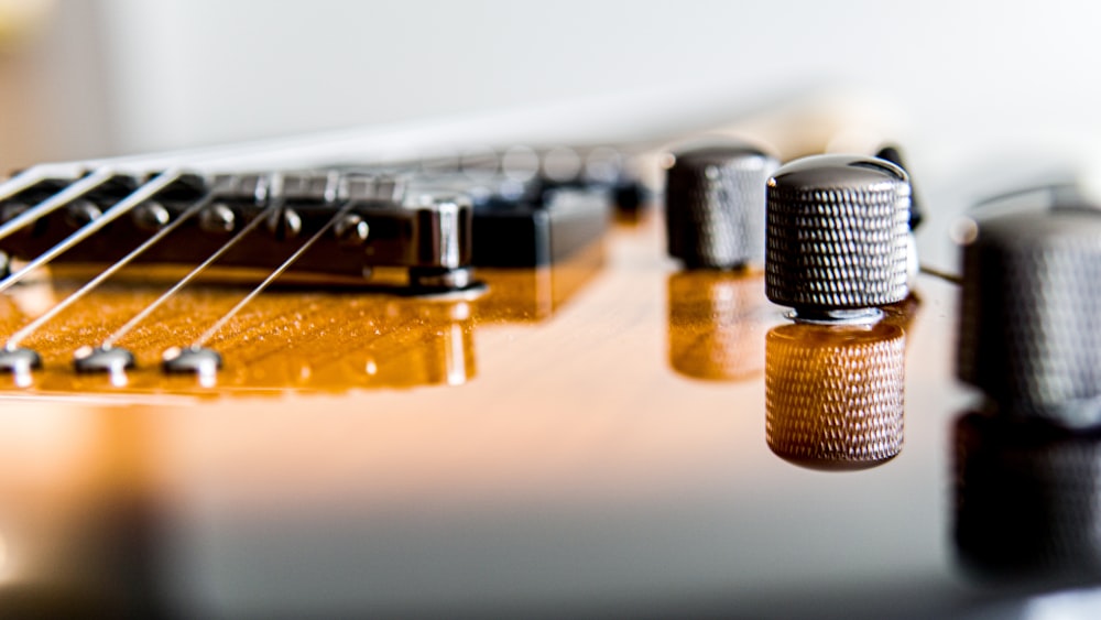 brown and black guitar headstock