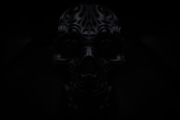 A haunting, deep black and gold image of Manly P. Hall surrounded by arcane books and symbols.