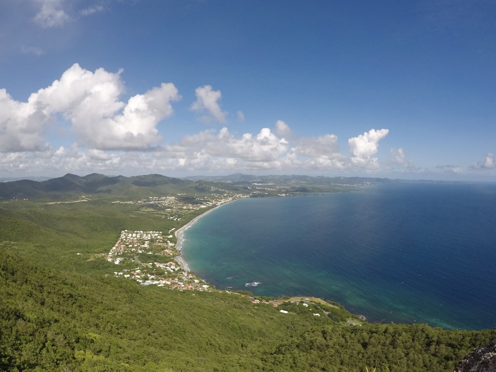 a scenic view of a tropical island and the ocean