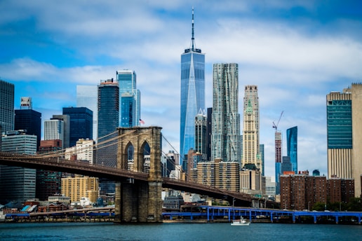city skyline under blue sky during daytime