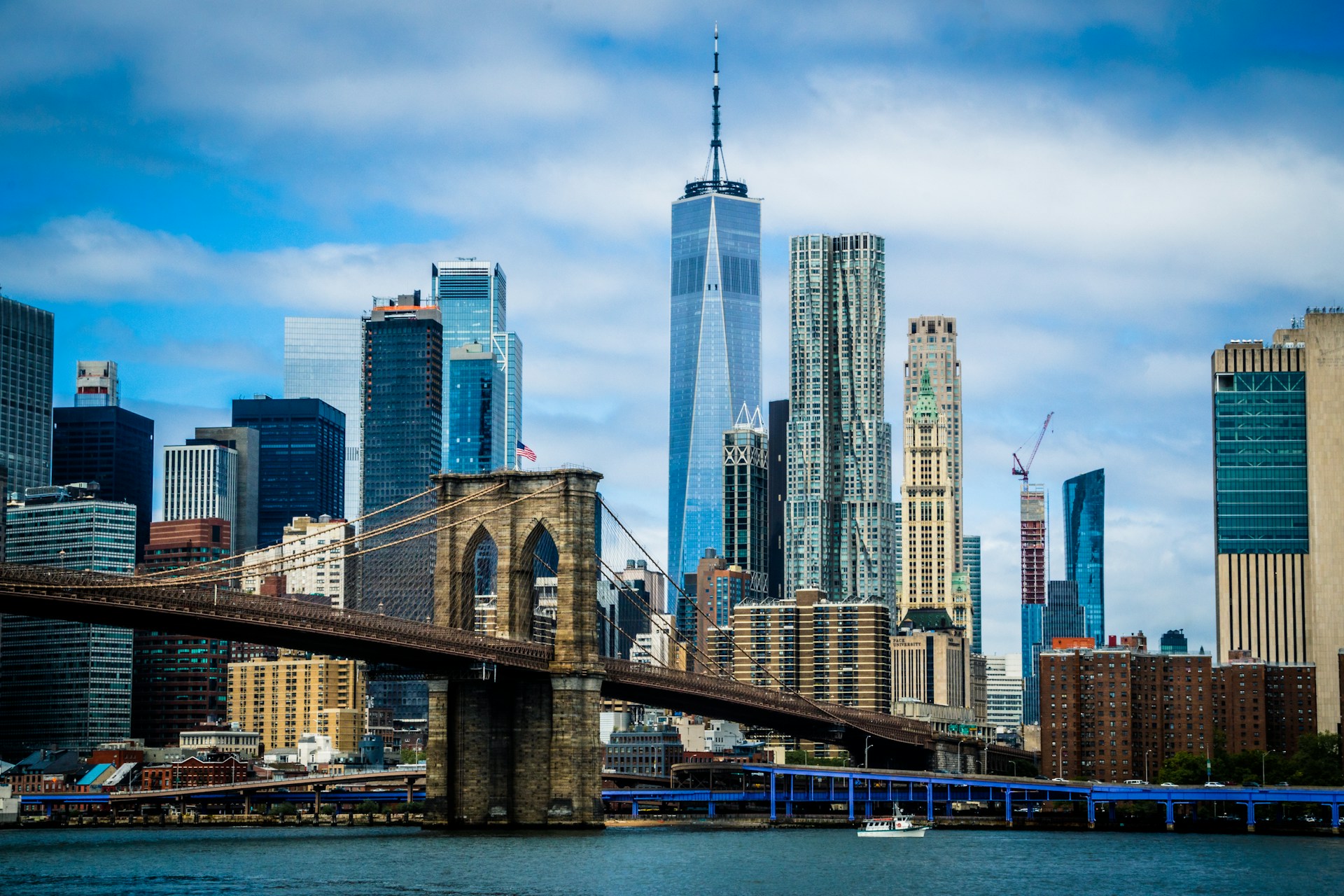 city skyline under blue sky during daytime