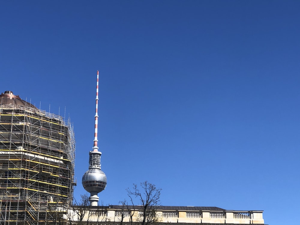 white and black tower under blue sky during daytime