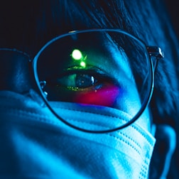 woman wearing black framed eyeglasses