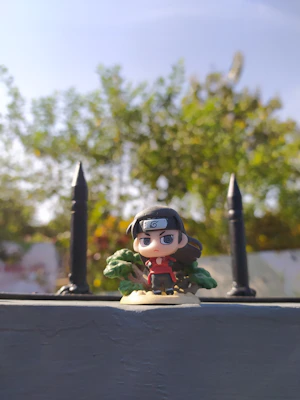 A detailed close-up of a premium anime figure showcasing intricate paintwork and dynamic pose.