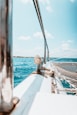 white boat on sea during daytime