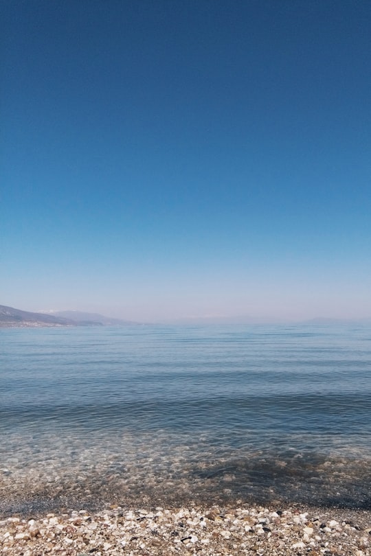 blue sea under blue sky during daytime in Pogradec Albania