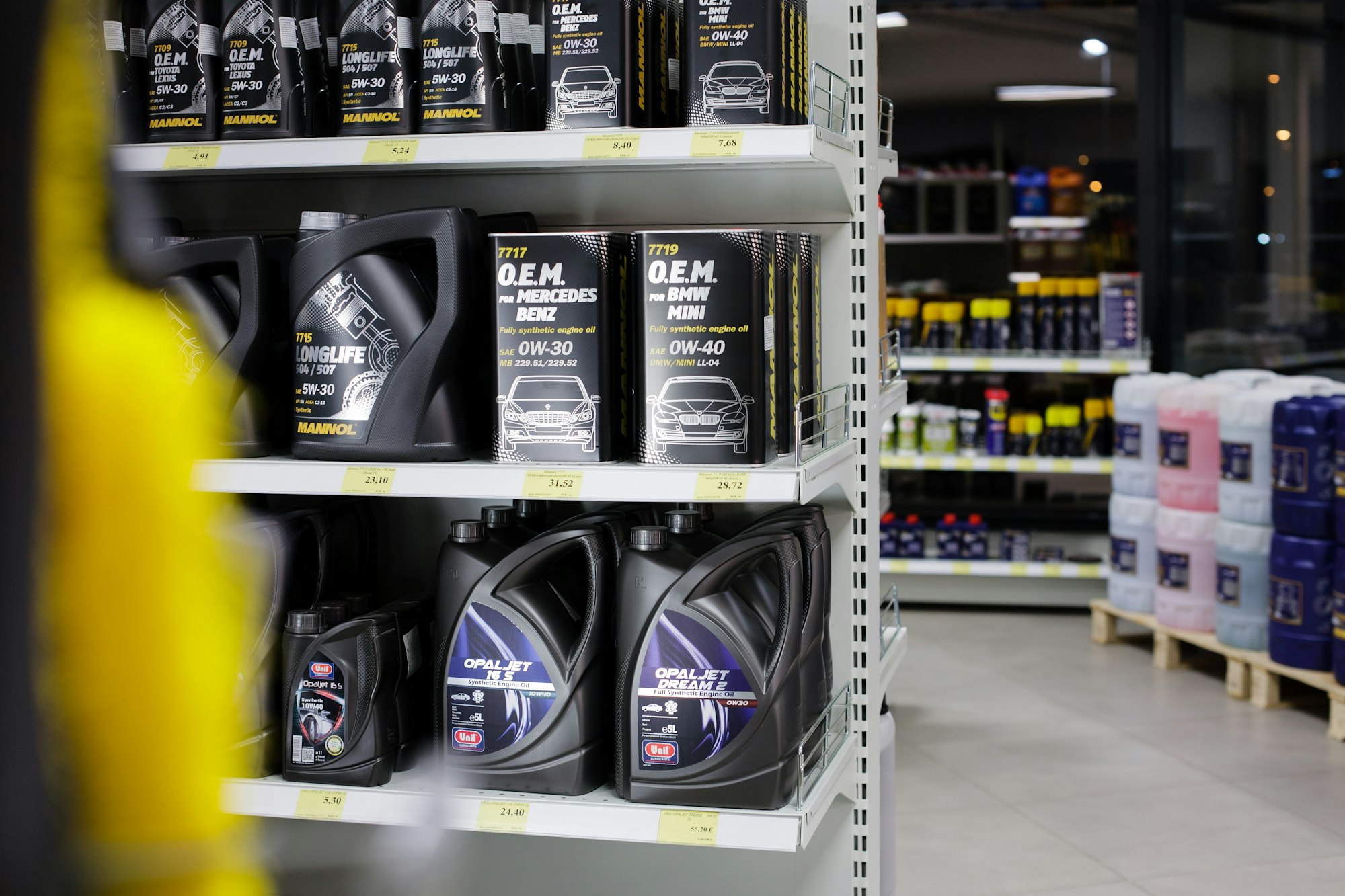 Automotive shop interior. Motor oil product shelf. Good for illustration in automotive editorials and blogs.