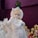 white ceramic angel figurine on table