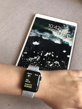 white samsung android smartphone with black and white polka dot case