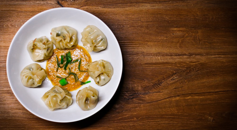 white ceramic plate with pasta dish