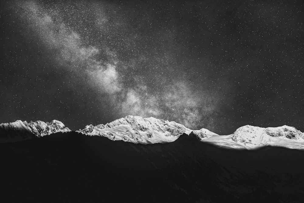 grayscale photo of snow covered mountain